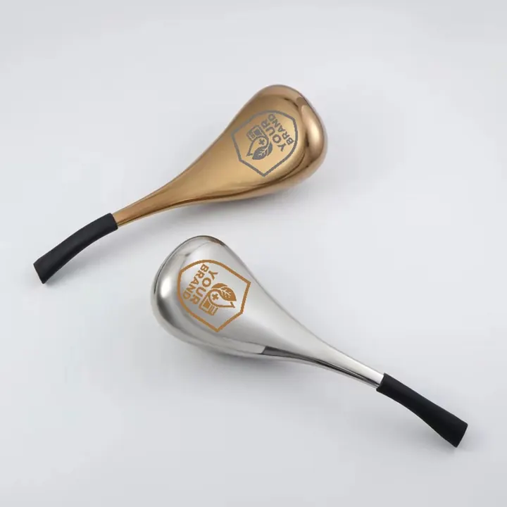 Branded stainless steel cryo comfort tools in gold and silver finishes, each carrying the YOUR BRAND shield.